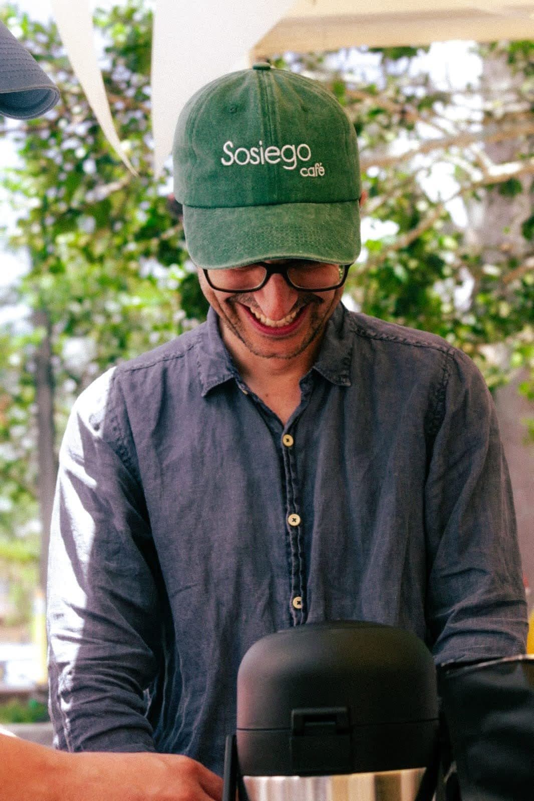 A member of the Sosiego team makes coffee at a fair